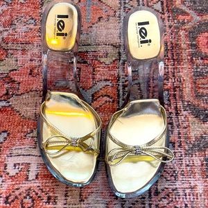 Super cute, vintage, Rare, L.E.I. clear heels with gold accents and tiny bow.